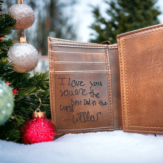 Personalized leather tri-fold wallet.